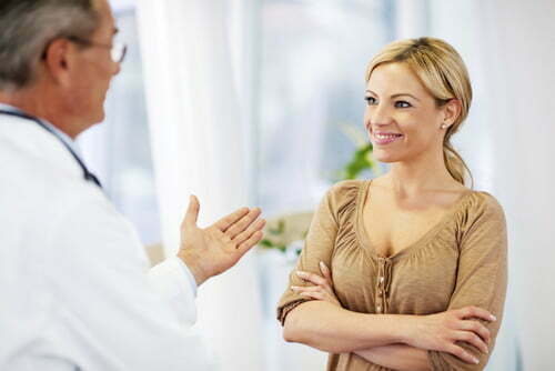woman talking with a plastic surgeon
