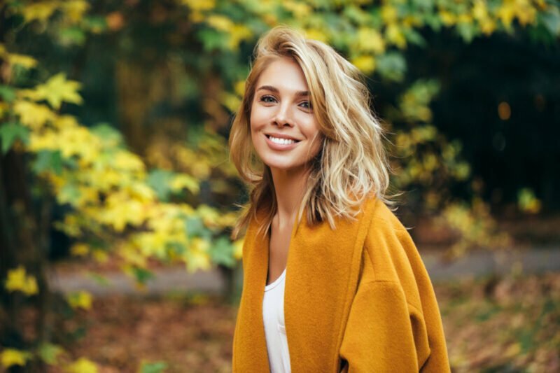 Young Woman Smiles and Enjoys Early Fall Now that Summer is Over in Hagerstown